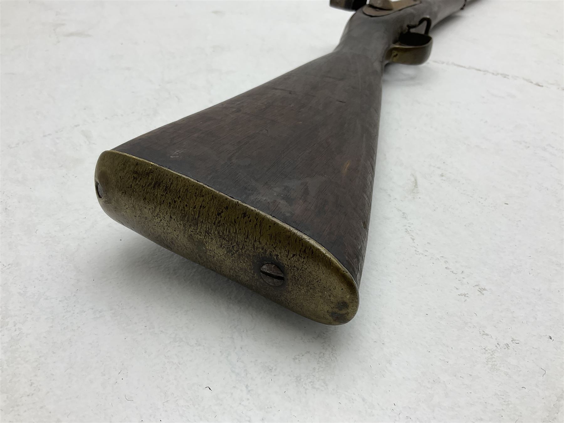 20th century Indian percussion military musket, approximately 20-bore, the 96.5cm barrel with three bands, the steel lock-plate marked 1862 Enfield, walnut full stock with brass fittings and under barrel ramrod channel L140.5cm overall