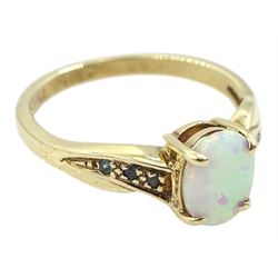 9ct gold single stone opal ring, with emerald set shoulders, hallmarked