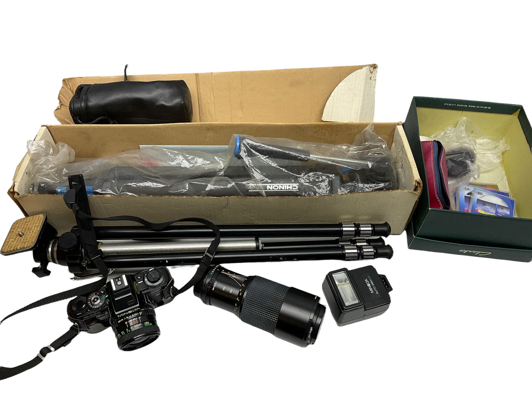 Minolta X-700 camera and lenses comprising Skylight 55mm lens and 135mm lens, Auto 280PX flash, together with other accessories to include tripod etc