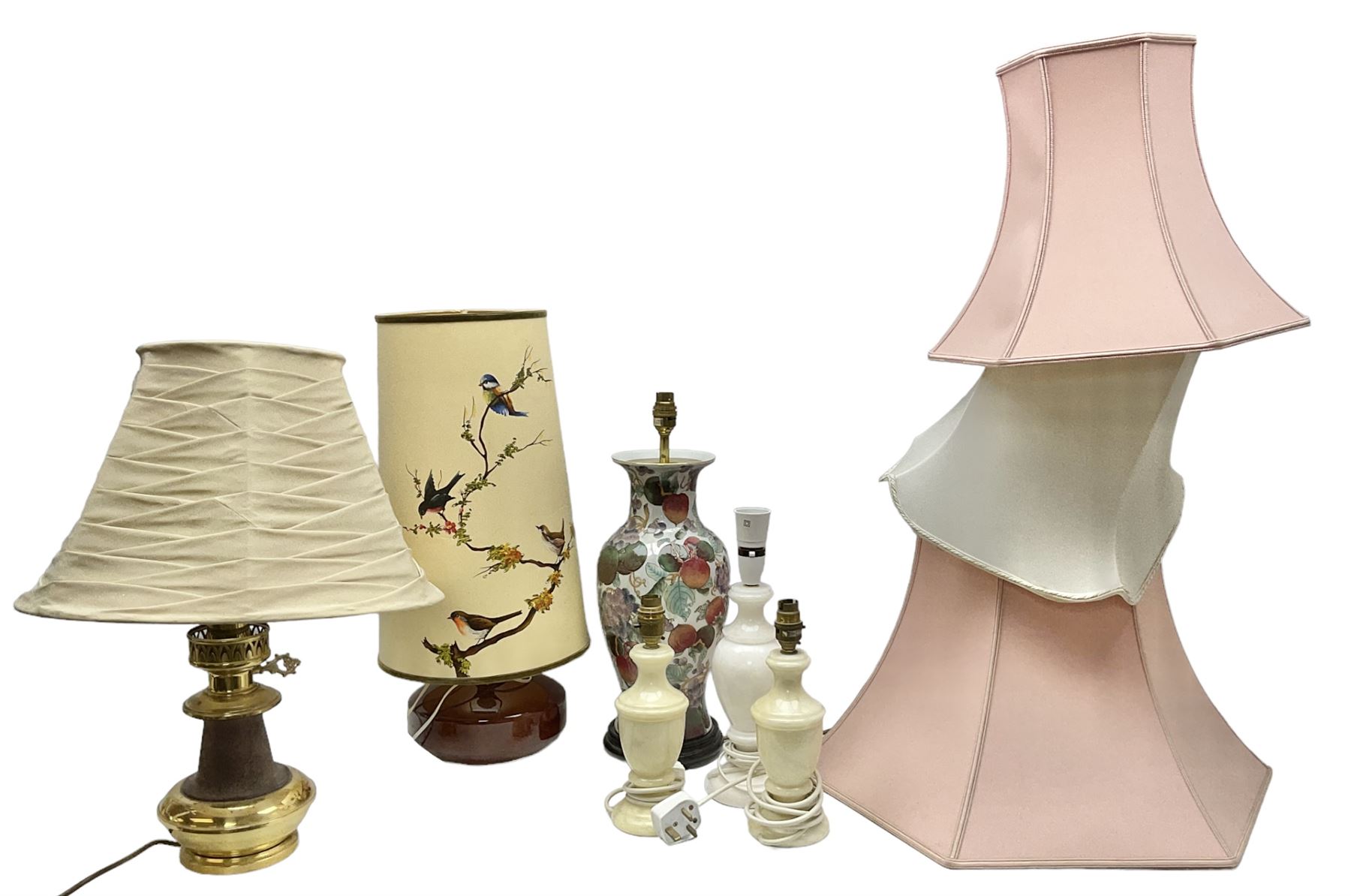 Collection of table lamps to include one of baluster form, decorated with fruit, one of squat, with a hand painted lampshade, and two standard lamps