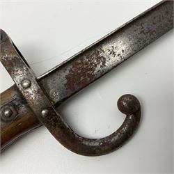 French Model 1892 Mannlicher Berthier bayonet with 39.5cm fullered blade; in metal scabbard with leather frog L54cm overall; and French Model 1874 epee bayonet (no scabbard) (2)