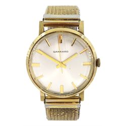 Gerrard gentleman's 9ct gold manual wind wristwatch, silvered dial with baton hour markers, London 1972, on expanding gilt strap, boxed