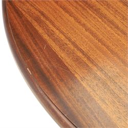 Regency design mahogany extending twin pedestal dining table with two additional leaves, raised on splayed supports terminating brass paw feet
Extends to 268cm