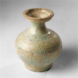 Green glazed 'Hu' jar, probably Han Dynasty, with flared rim H15.5cm 
