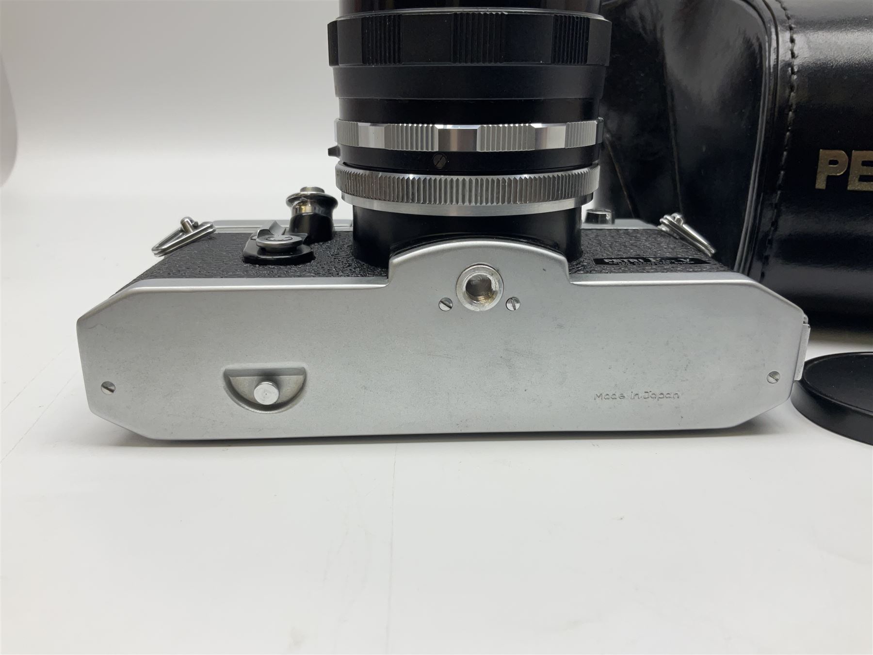 Petri Flex 7 camera body, serial no. 555698, with Perti C.C 1:1.8 f=55mm' lens, serial no. 78253, together with Petri Flex V2 camera body, serial no. 364427, with 'Petti C.C. 1:2 f=55mm' lens, serial no. 137076, in ever ready case