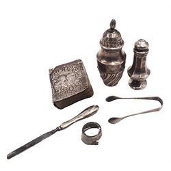 Group of silver, including pepper shaker, salt cellar, sugar tongs and a bible