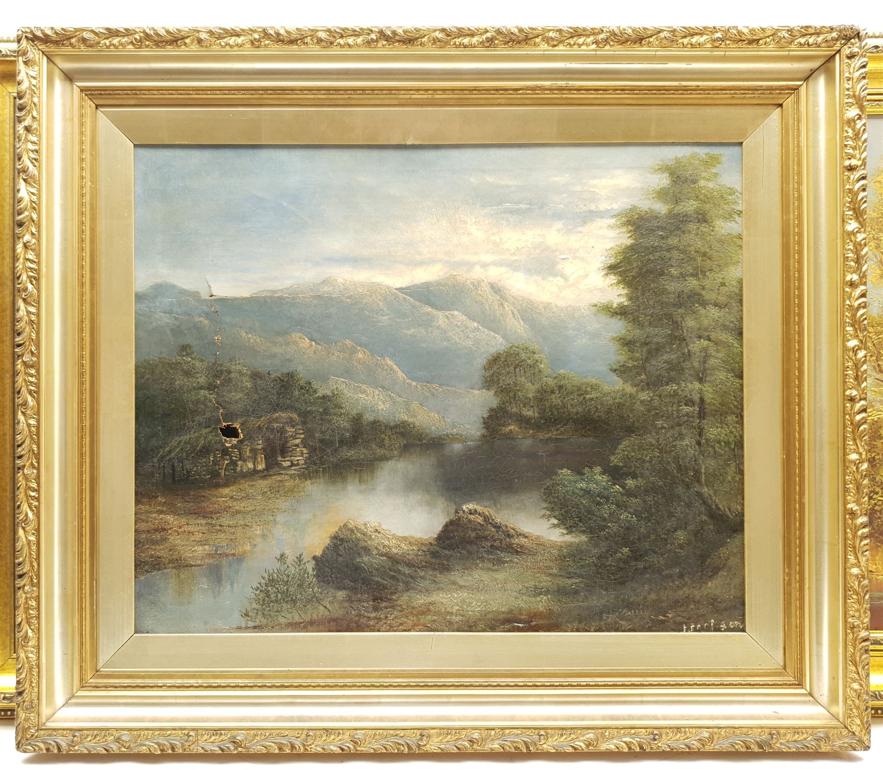 Hans Wagner (Continental 20th century): Fishing in a Mountainous Lake Landscape, oil on canvas signed 49cm x 100cm; Continental School (Early 20th century): Mountain Landscape, oil on canvas indistinctly signed 45cm x 56cm (a/f) in heavy gilt frame (2)