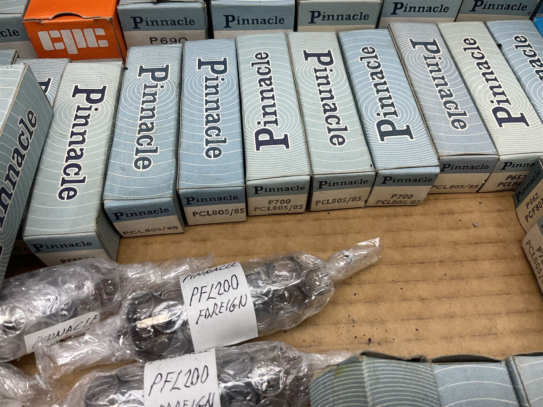 Collection of Pinnacle thermionic radio valves/vacuum tubes including PL509, PL519, PY500A, PL608, PCL86, the majority in original boxes, approximately 105 