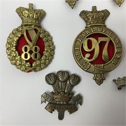 Fifteen cap badges of Irish interest including 4th Royal Irish Dragoon Guards, Connaught Rangers, Royal Irish, Munster and Dublin Fusiliers, 5th Lancers, Inniskilling Regt.,Leinster Regt., Irish Guards etc (15)