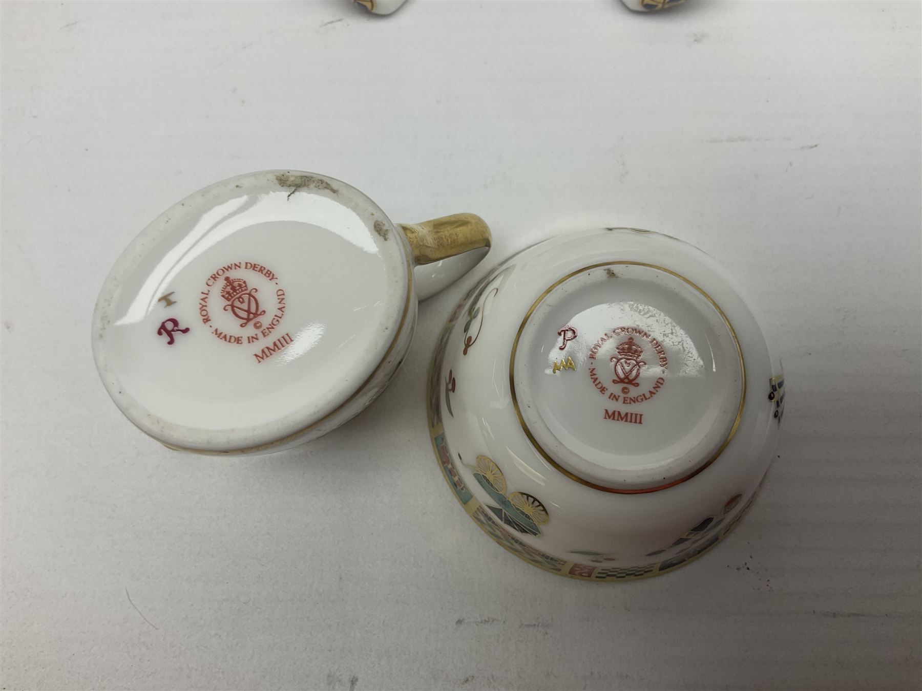 Royal Crown Derby Treasures of Childhood cabaret set, comprising tray, milk jug, sucrier, teacup and saucer, together with two Royal Crown Derby Treasures of Childhood paperweights Fleur and Ragdoll Sailor and Teddy bear paperweight, all paperweights are without stoppers