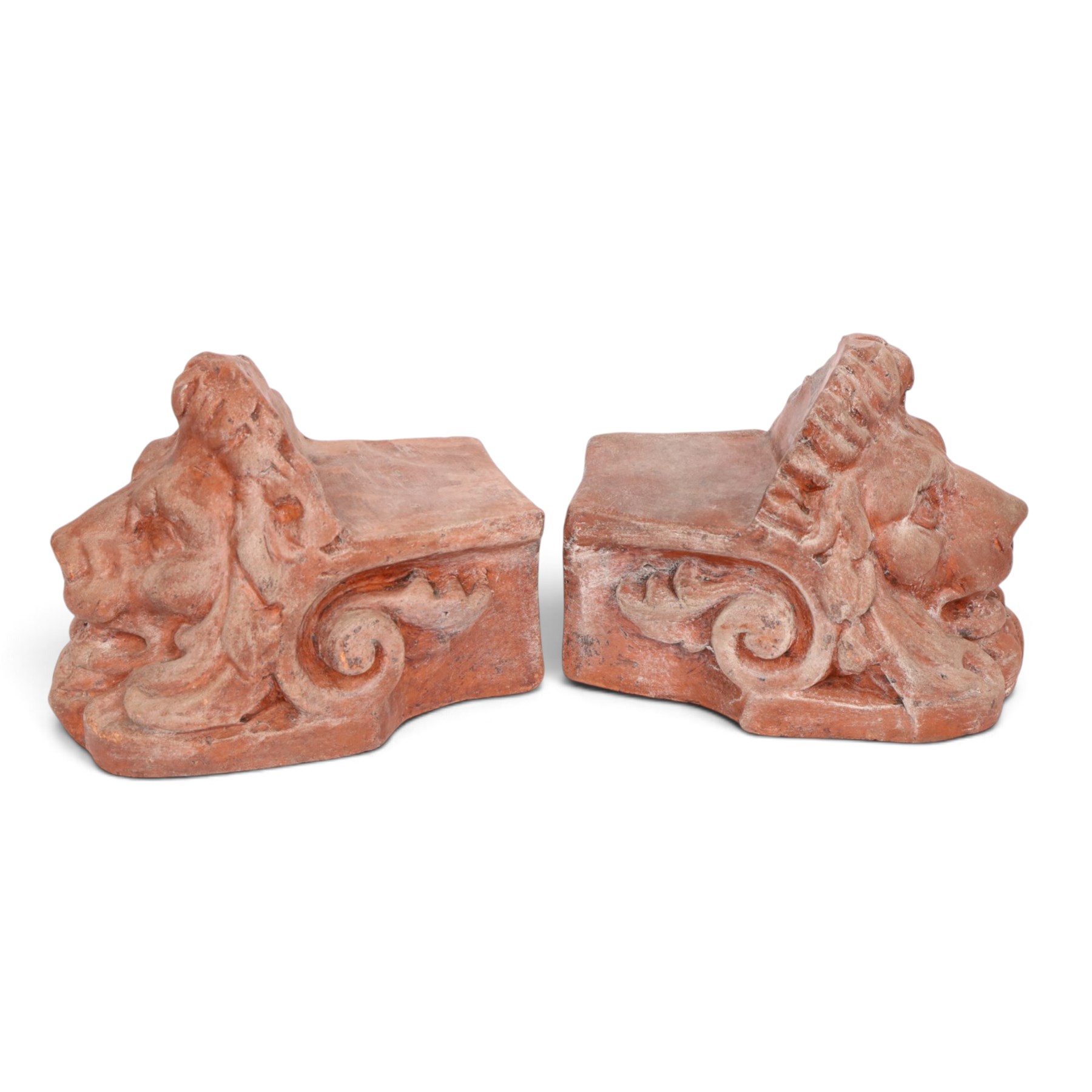 Pair of 19th century terracotta lion sash window rests, H18cm, L22cm
