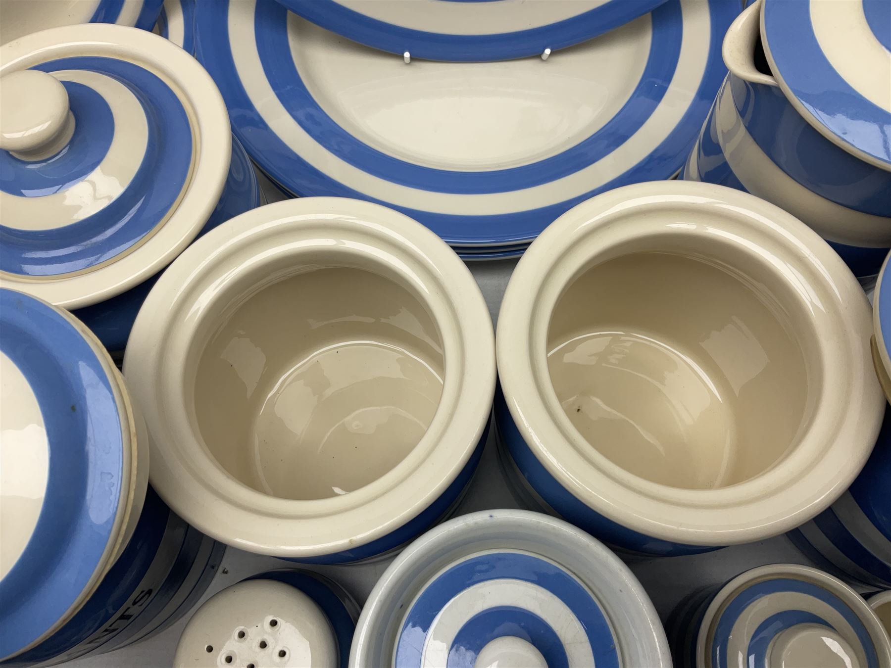 TG Green Cornish kitchen ware, to include coffee pot, pint milk jug, nine storage jars for various items, four dinner plates, etc (25)