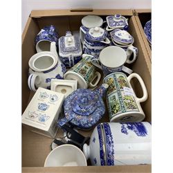 Collection of Ringtons tea and dinnerware, including a set of willow pattern milk jug and sugar bowl,  teapot and milk jug with floral decoration, a selection of storage jars etc, two boxes. 