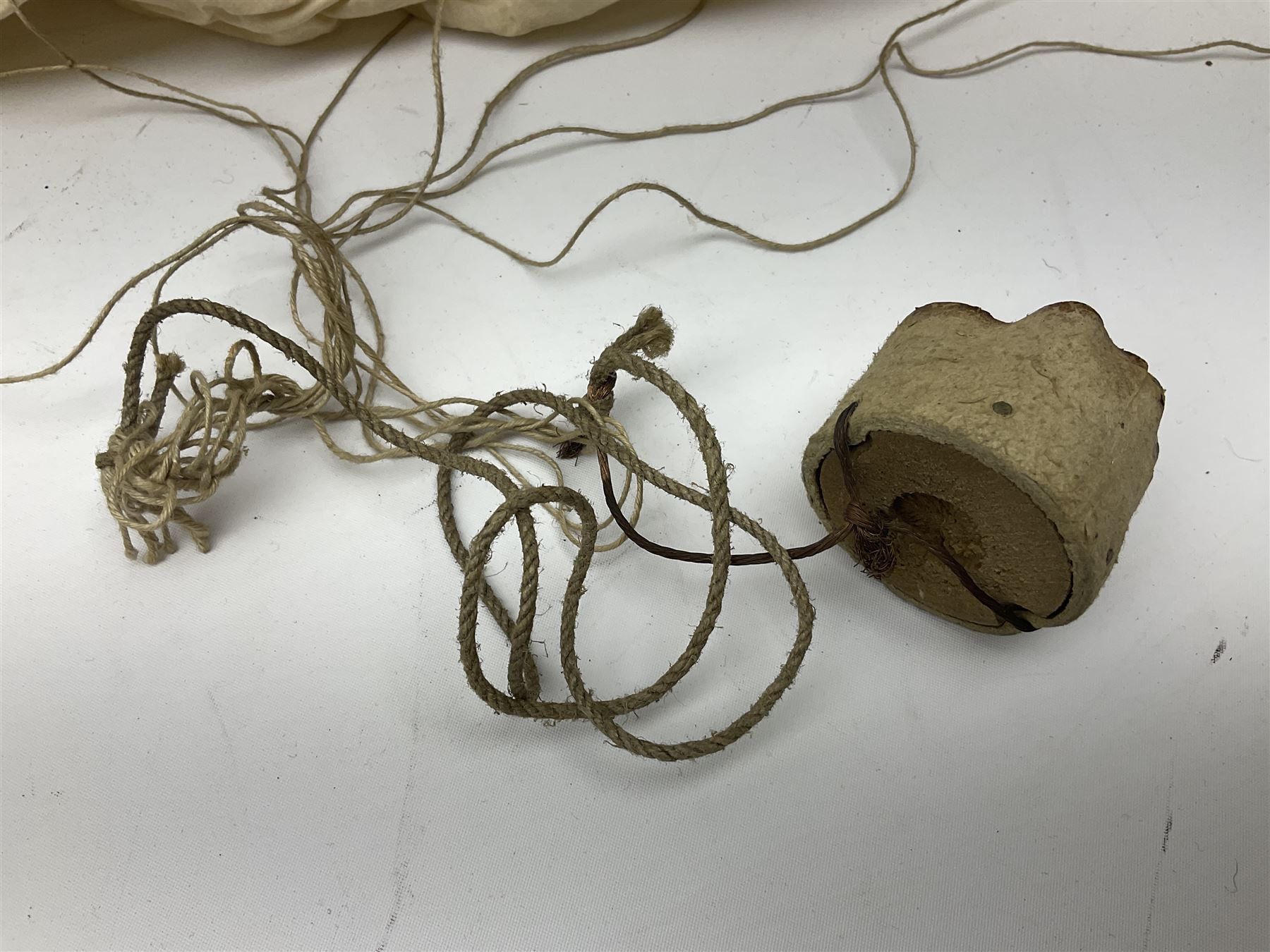 Two inert WW2 parachute flare casings, one with parachute and dated 5/43 L24cm (3)