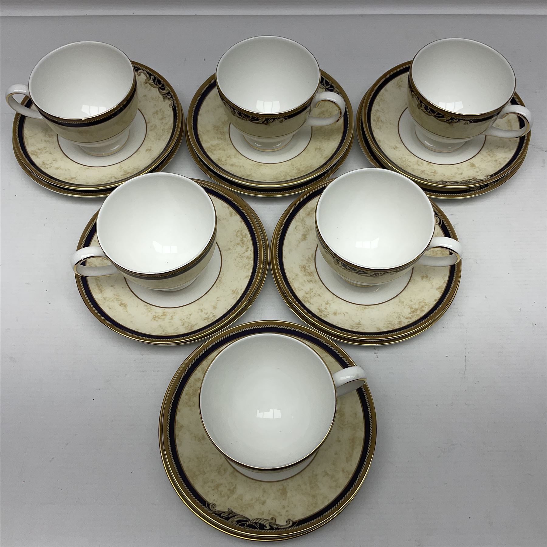 Wedgwood Cornucopia pattern tea service for six, comprising dessert plates, teacups and saucers (18)