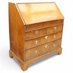 18th century walnut and herringbone banded bureau, the fall front enclosing a stepped and arched interior fitted with pigeonholes, drawers and concealed compartments, green tooled leather writing surface, over two short and three long graduated drawers with brass escutcheons and bail handles, shaped bracket feet