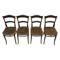 Jacob & Josef Kohn - set of four early 20th century Austrian bentwood chairs, each with carved decoration to the shaped backrest and shaped seat, on splayed supports with stretchers, marked with the manufacturer's stamp and paper label beneath