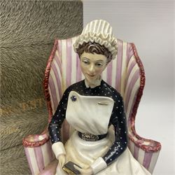 Royal Worcester limited edition figure, Sister St Thomas Hospital (London), no 180/500, modelled as a nurse in uniform, sitting on a striped wingback chair, with printed mark beneath, in original box with certificate, H16cm