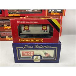 Hornby '00' gauge - twenty goods wagons including freightliners with containers, 100 ton Tankers, Car Transporter with cars, Hopper Wagons, Closed Vans etc; together with another two by Lima and Dapol; all boxed (22)