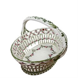 Moore Bros basket, decorated with floral sprigs and gilt detail, together with another basket and glass dish