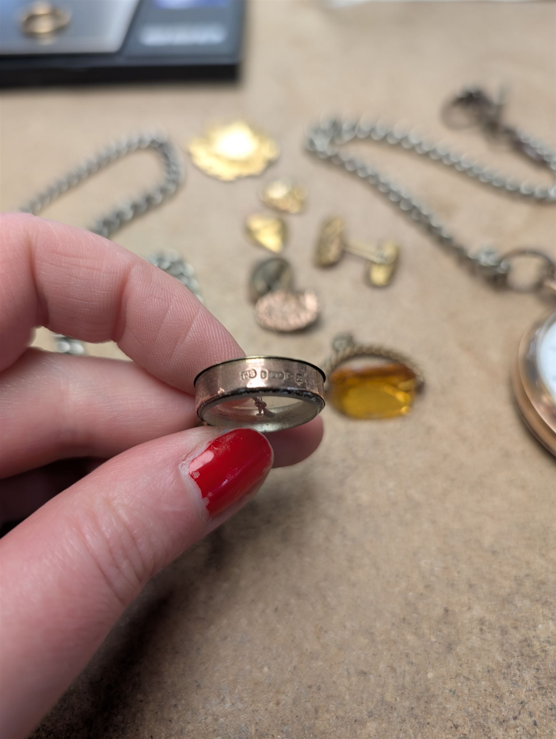 9ct gold mounted compass charm and a 9ct gold wedding band, hallmarked, together with a gold plated American Waltham Watch Co pocket watch, a silver watch chain and other gilt metal jewellery