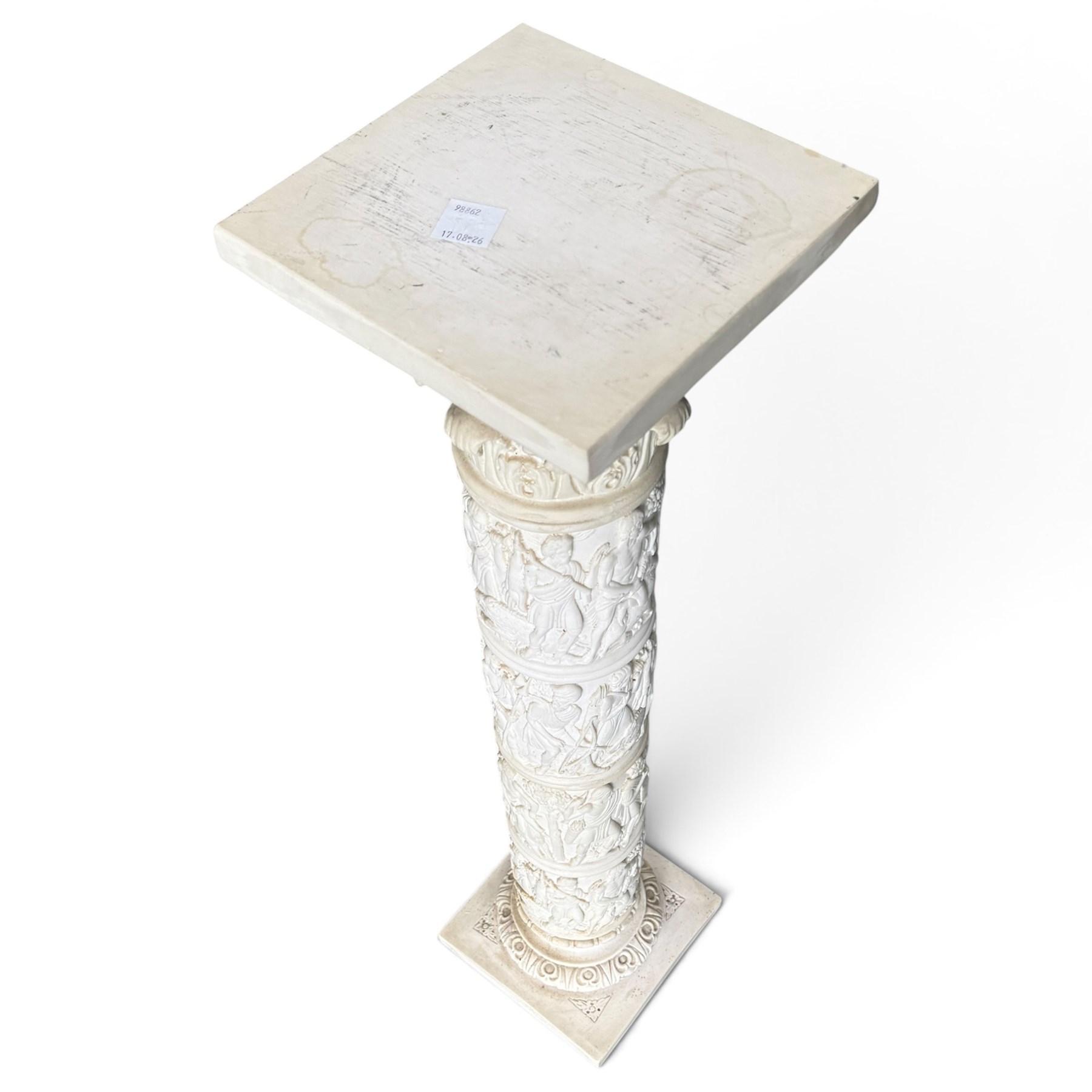 Neoclassical design composite column, square top over composite Ionic and Corinthian capital, the pedestal decorated with hunting and religious procession scenes, waisted and foliate socle on square base