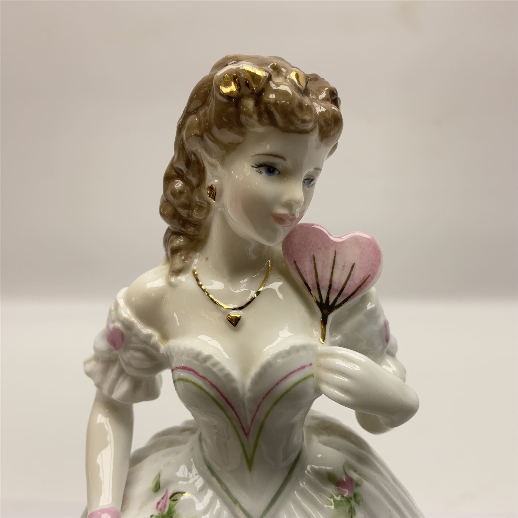 Three Royal Worcester figurines,  The First Quadrille, The Fairest Rose and Queen of Hearts, largest H21cm