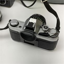 Canon AE1 camera, 'no. 4403757', fitted with Canon 'FD 50mm 1:1.8' lens, Hoya 'HMC Wide-Auto f24mm 1:2.8' lens and various other lenses and camera accessories, housed in a soft carry bag