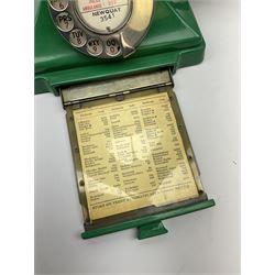 Jade green Bakelite telephone, of pyramid form with rotary alphabet dial, brown braided handset cord and a base draw, W18cm D14cm H15cm