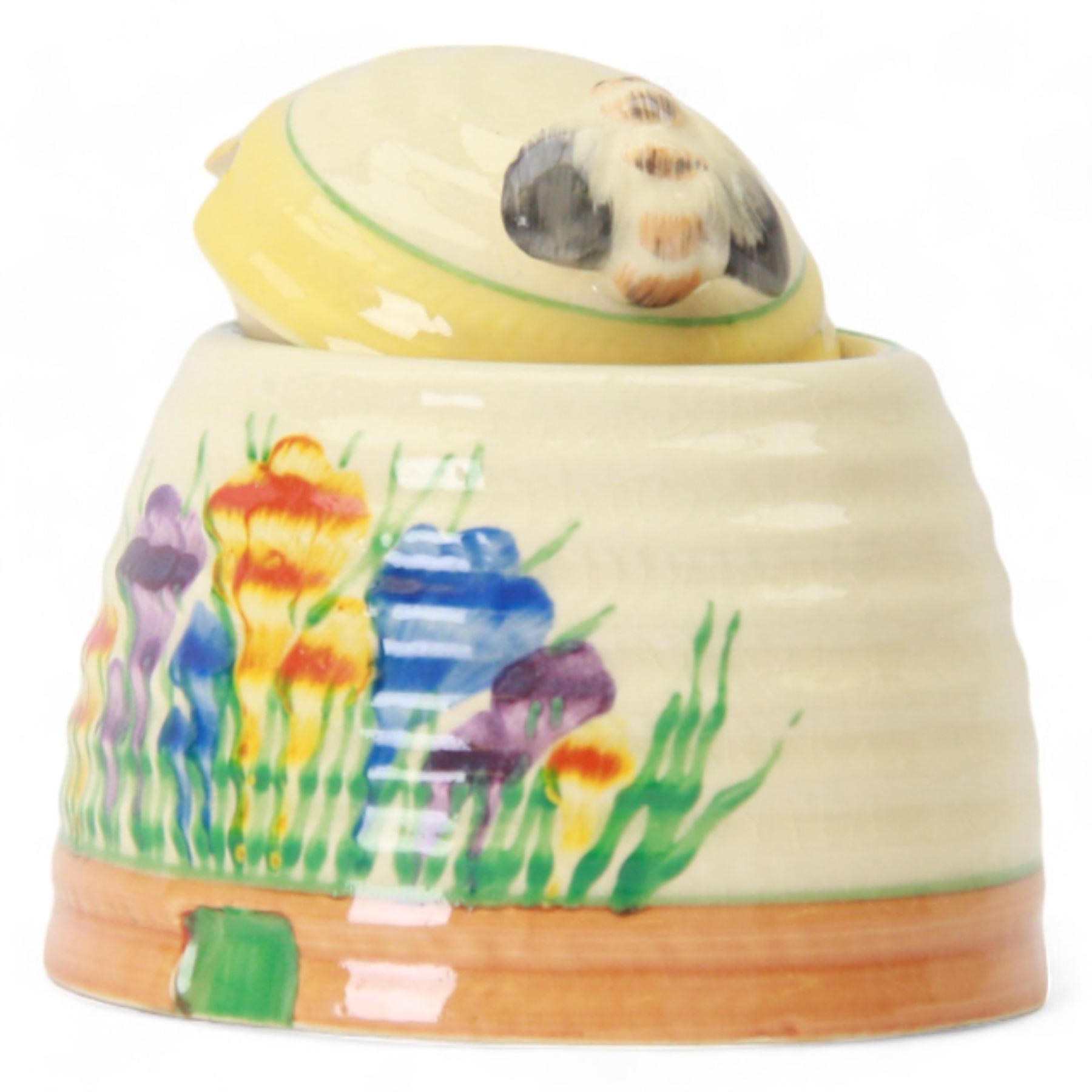 Clarice Cliff Bizarre for Newport Pottery, beehive honey pot with cover in Crocus pattern, with printed mark beneath, H9cm