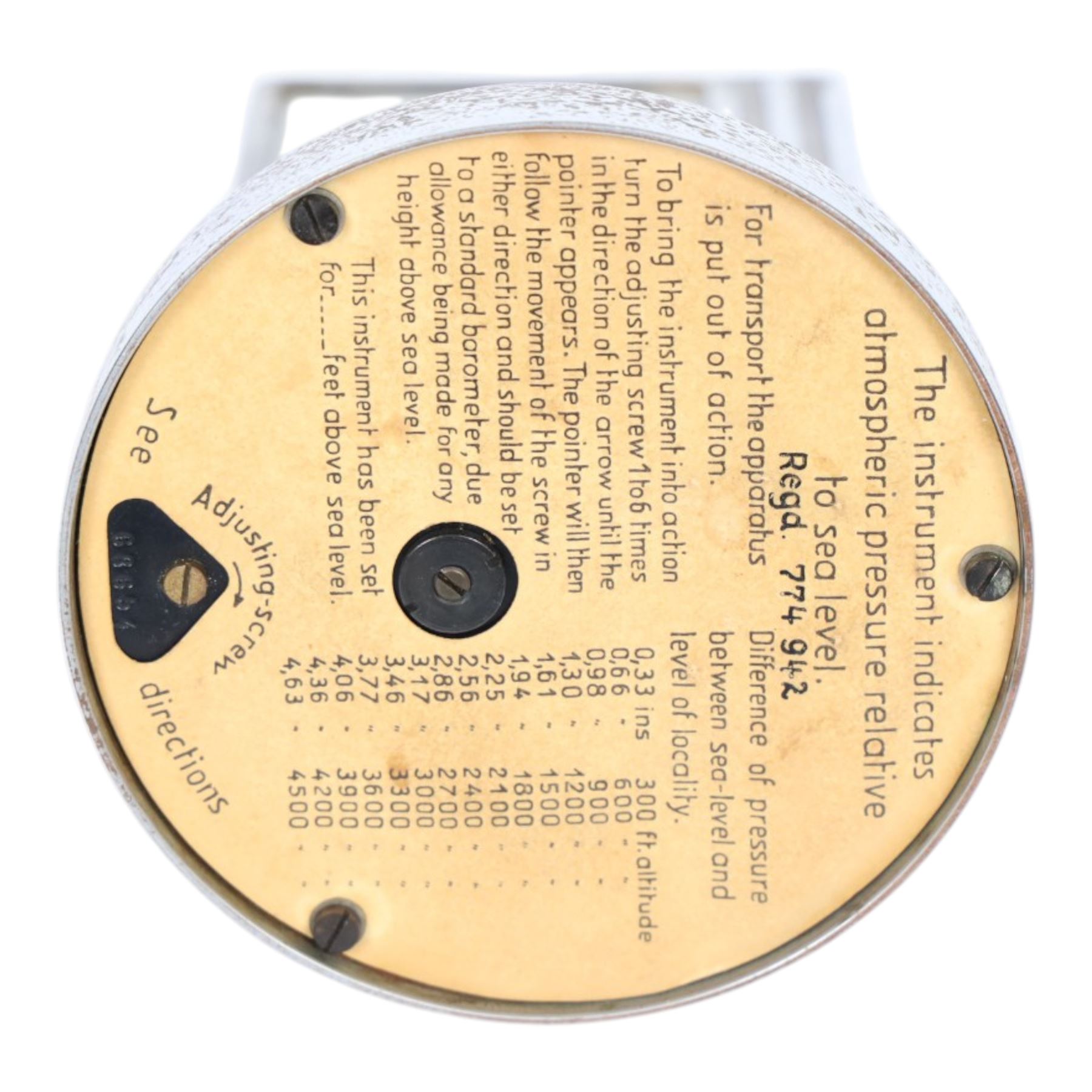 Art Deco chrome plated desk aneroid barometer by Zeiss Ikon, with frosted glass panel to rear, upon raised on a stepped circular base with instructions printed on the underside, H16cm