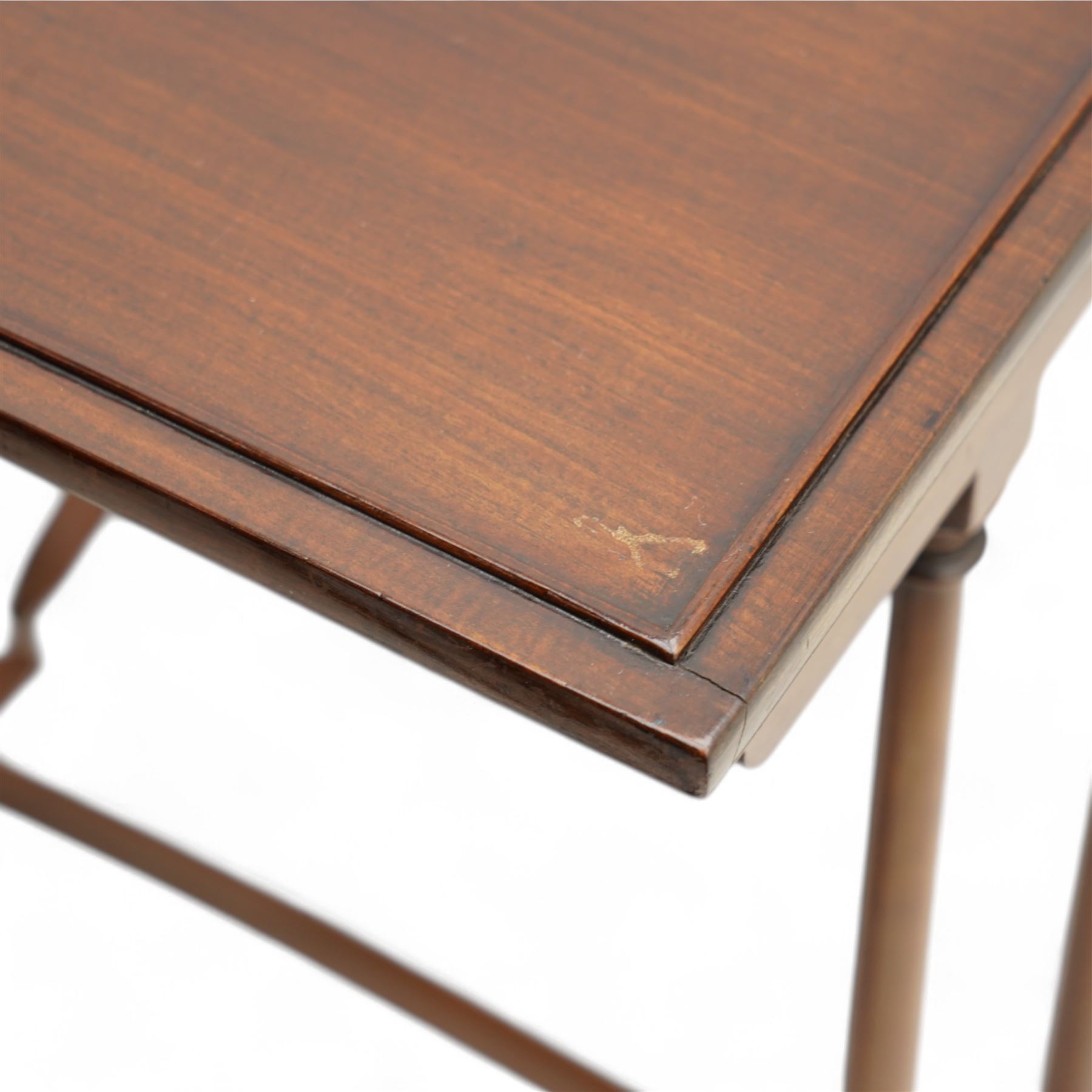 Early 20th century mahogany quartetto nest of four occasional tables, each with rectangular top with raised lip moulding, turned supports on splayed feet