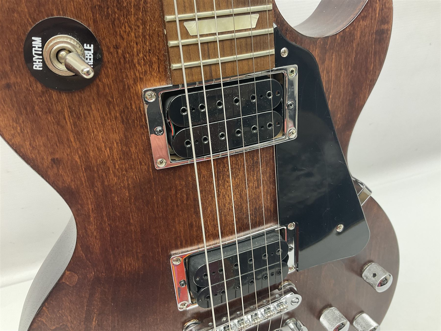 2012 American Gibson Les Paul Studio electric guitar, retro fitted with iron gear pick-ups, push-pull 'pots', roller bridge, string butler and locking machines, serial no.115321594, L99cm overall; in Gibson soft carrying case.