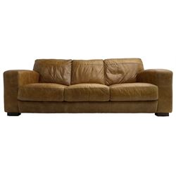 Traditional shaped three seat sofa, upholstered in tan leather
