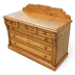 William Snowdon of Rochdale (fl.1876-1886) - Victorian sycamore chest of drawers, rectangular top with shaped gallery back above an arrangement of three short and three long drawers, each with moulded borders and turned wooden pulls, flanked by carved upright corbels, on a plinth base (99cm height including gallery)