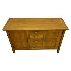 Laura Ashley - 'Milton' light oak sideboard, fitted with four central drawers flanked by two panelled cupboards, on square supports