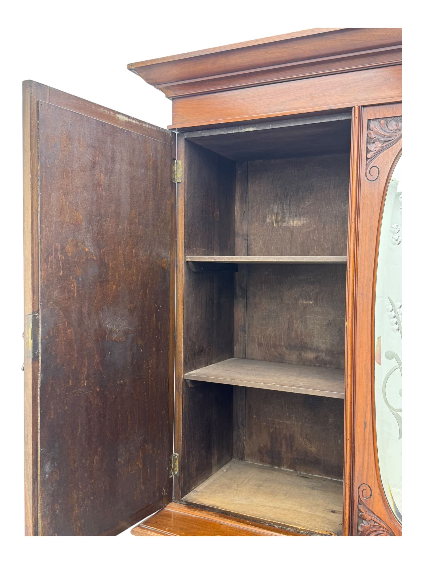 Victorian walnut dresser, projecting cornice over mirrored front, fitted with two short over two long drawers, on turned feet