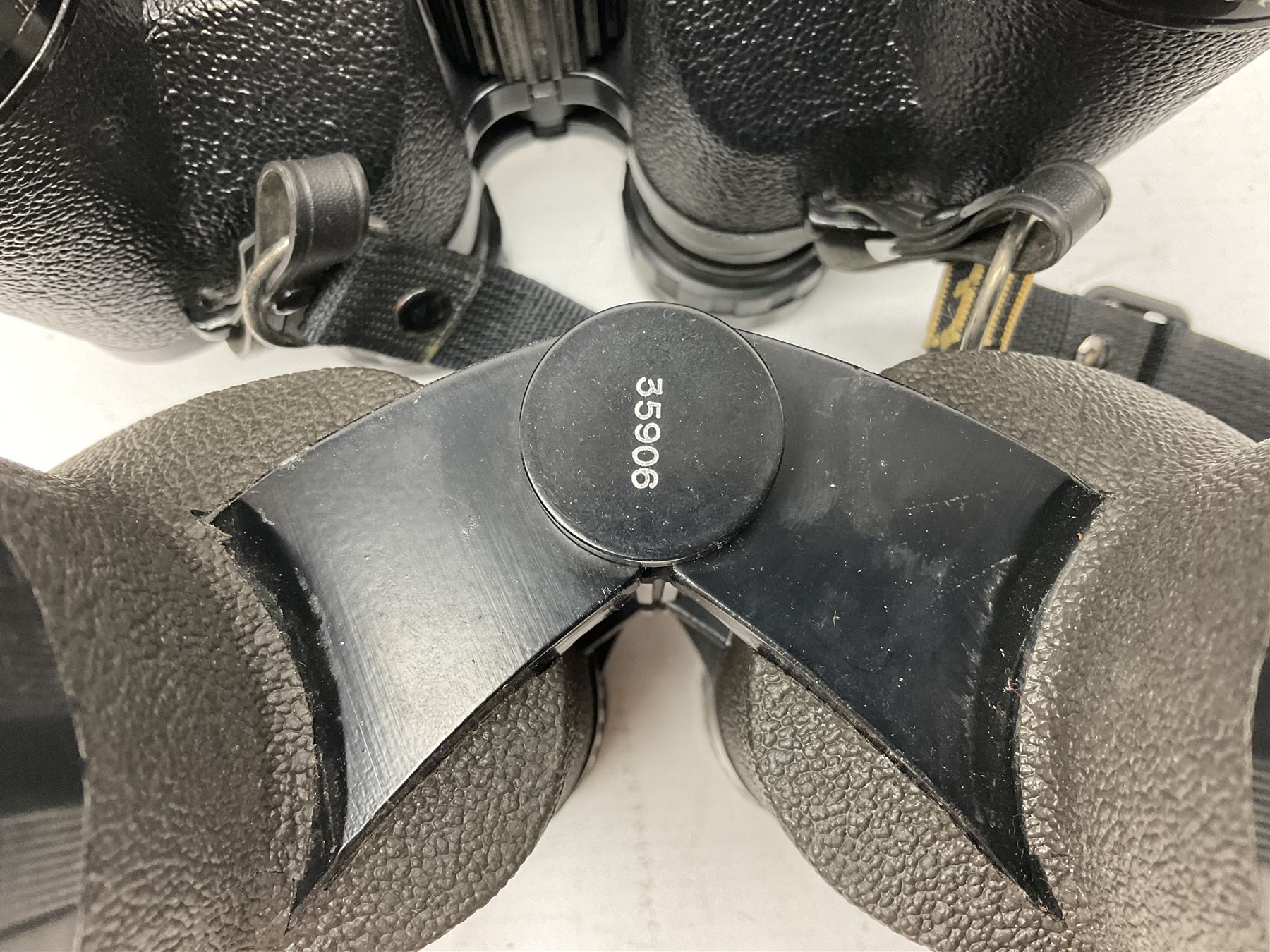 Eleven cased pairs of binoculars to include Summit 8x30,  Concord 8x40, Tasco no. 106 8x - 16x40, Chinon 10x50, Tokina 7x42 Field, Zoom 6x- 12x32 etc