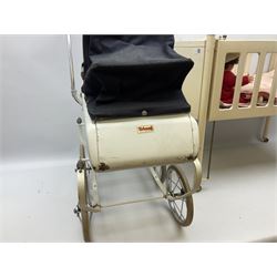Toy doll's crib, together with Triang toy pram and seven dolls, crib H59cn