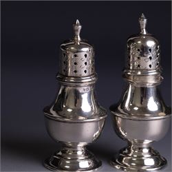 Silver cruets, including pair of open salts, mustard pot and cover, two silver pepper shakers and a collection of spoons, all hallmarked