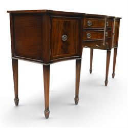 Georgian design mahogany serpentine sideboard, shaped top over two central drawers flanked by cupboard doors, flame mahogany veneered fronts with satinwood stringing, oval brass handles, shaped apron, on square tapering supports with spade feet