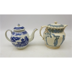  Late 18th century English blue and white Willow pattern teapot, H18cm and a 19th century stoneware teapot, applied oak leaf border and figures, Bacchus moulded spout (2)  