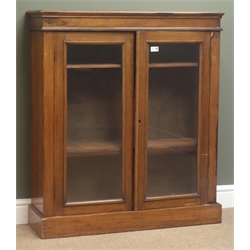  Small Edwardian walnut bookcase, two glazed doors enclosing two shelves, plinth base, W90cm, H102cm, D28cm  