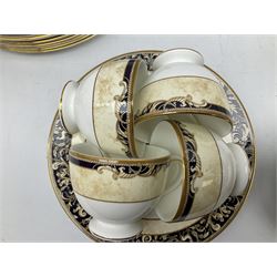 Wedgwood cornucopia pattern tea and dinner service, comprising teapot, ten cups and saucers, milk jug, open sucrier, eight dessert plates, fourteen dinner plates, eight side plates, six bowls, two open serving dishes and one covered twin handled dish (53)