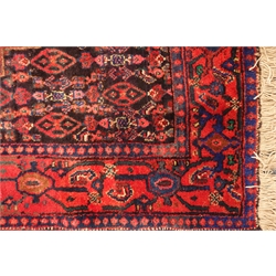  Kurdish red ground rug, central medallion, 168cm x 117cm  