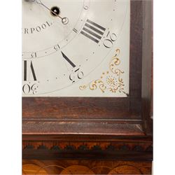 Penlington of Liverpool – early 19th century 8-day mahogany longcase clock, swans neck pediment with three turned wooden finials and verre eglomise panels, trunk with reeded columns and wavy topped door, plinth with canted corners on bracket feet, painted break-arch dial with Roman numerals and five-minute Arabic’s, centre sweep calendar and seconds hands, blue steel serpentine hands, signed beneath a painted rolling moon in the arch PENLINGTON, LIVERPOOL, eight day four pillar movement, anchor escapement and rack striking on a bell. With pendulum and weights.  The Penlington family were prolific clockmakers in 19th century Liverpool working from several addresses in the city, also recorded as chronometer and chronograph makers.