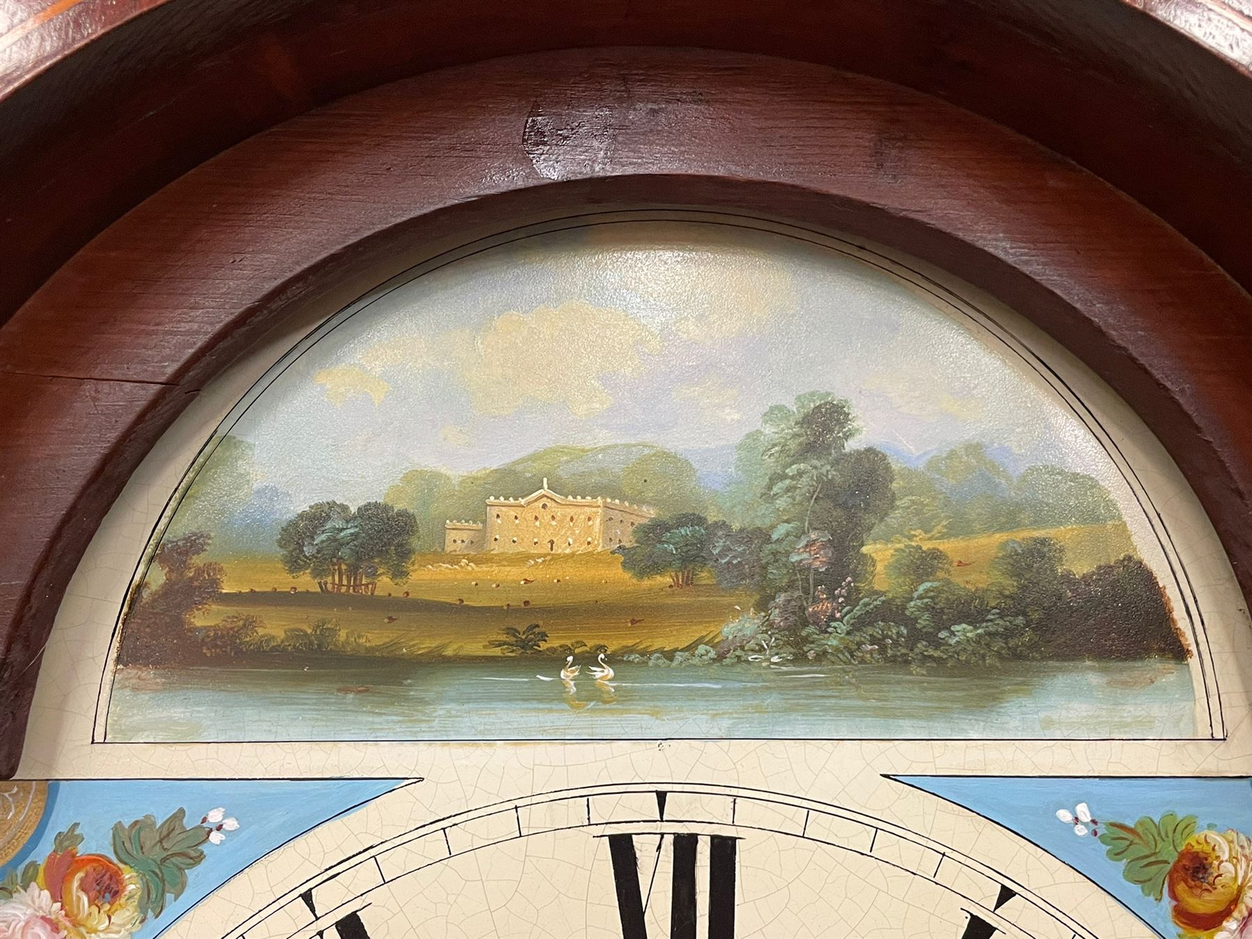Musson of Louth - mid-19th century oak and mahogany 8-day longcase clock, with a swan’s neck pediment and ball and spire brass finial, break arch hood door flanked by reeded pilasters with brass capitals, canted angled trunk, flat topped door with concave corners, rectangular plinth on bracket feet, fully painted break arch dial with Roman numerals and minute track, subsidiary seconds dial and calendar aperture, matching stamped brass hands, eight day rack striking movement with anchor escapement. With weights and pendulum.
H206 W44 D23
Balthazar Musson from Baden (Germany) is recorded as working in Louth from 1835, naturalised 1861-8. Succeeded by his son, George Balthazar 1872-1920. 
