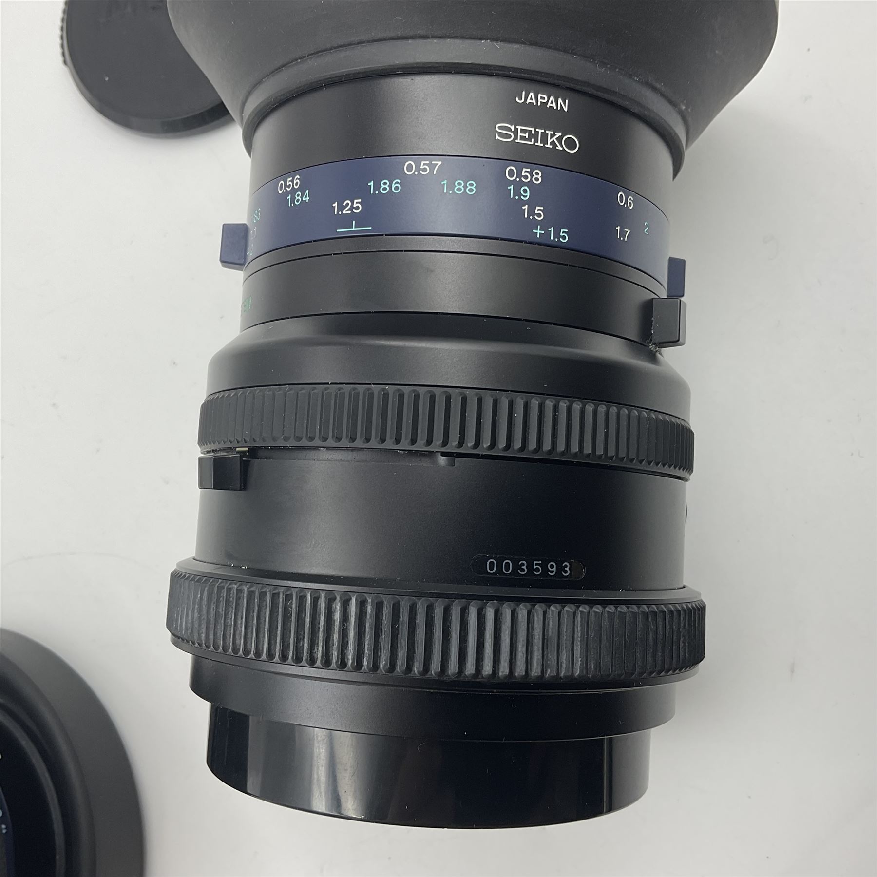 Seiko 'Mamiya Macro M 1:4.5 f=140mm M/L-A' lens serial no 003593 and Seiko 'Mamiya-Sekor Z f=110mm 1:2.8W' lens, serial no 56560