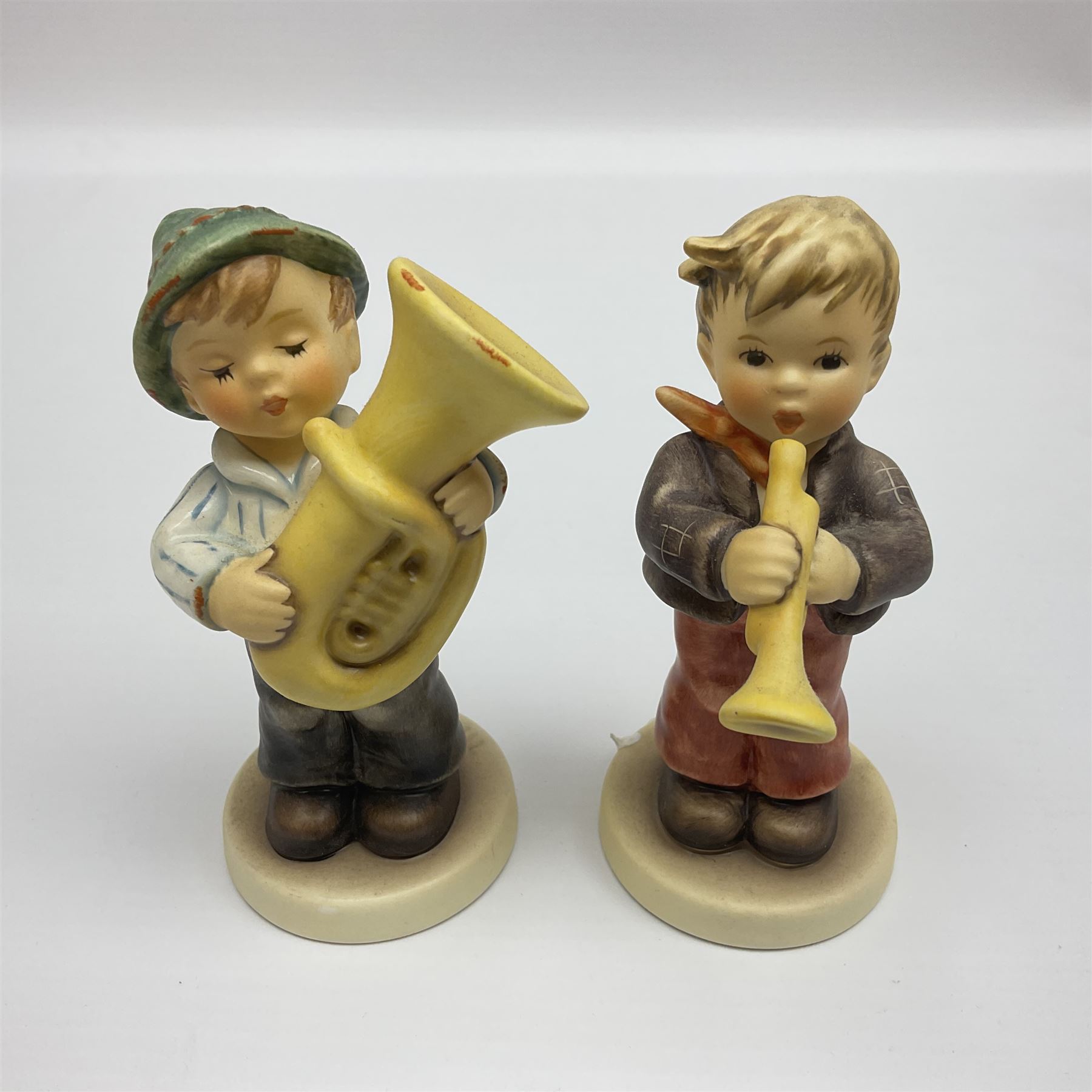 Hummel by Goebel, Sounds of Spring collectors set, eleven piece set comprising  turntable maypole stand, two smaller stands and eight figures, maypole stand H27