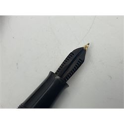 Group of Waterman pens and propelling pencils, to include a fountain pen, the black barrel with rolled gold cap and nib stamped 14ct, together with a matching propelling pencil, in box, together with a further fountain pen with gold nib stamped 14ct, stainless steel fountain pen and rollerball set in box, propelling pencil with maroon barrel etc, largest L13cm (7)